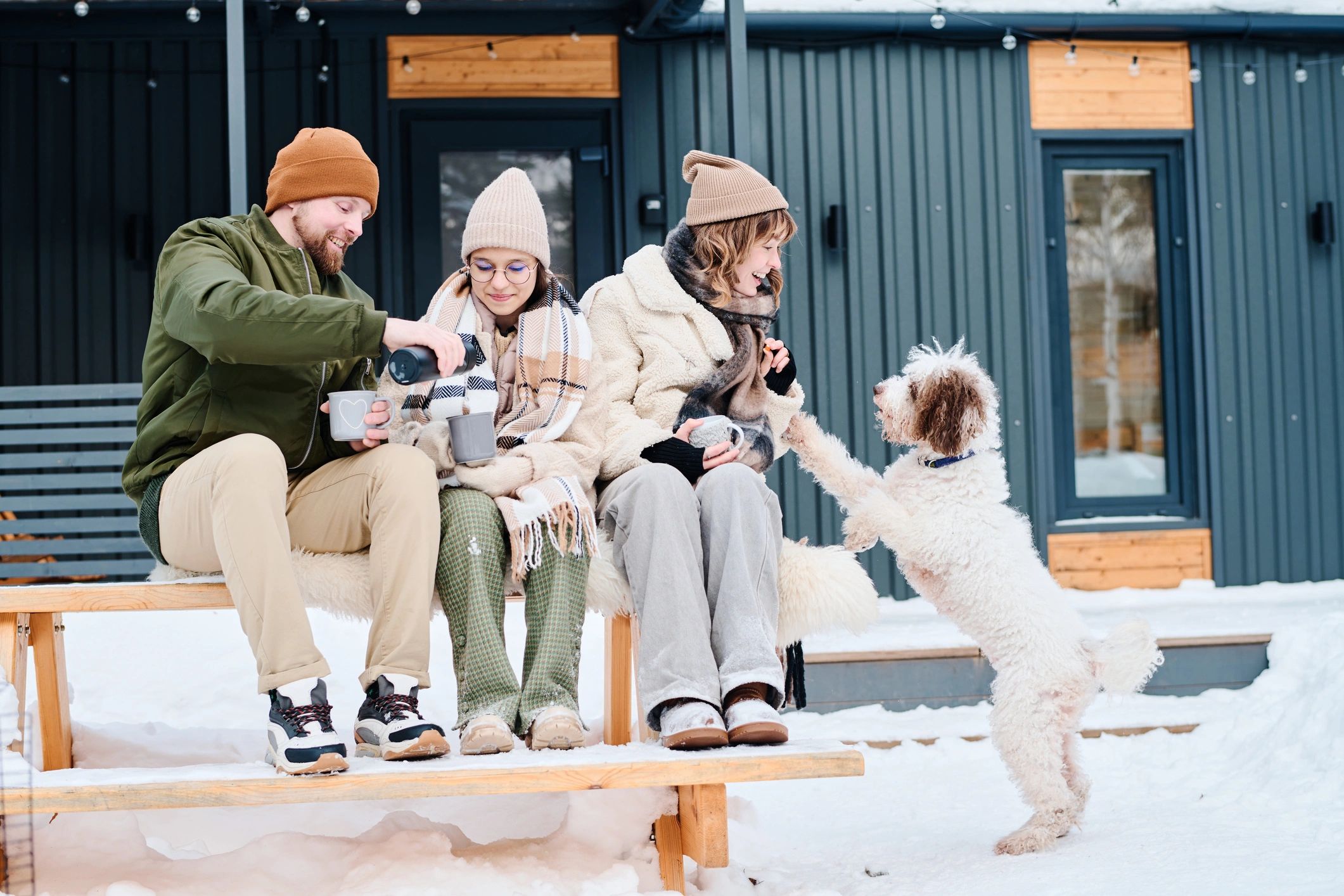 Family spending time outdoors with their dog
